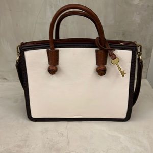 Brown and off white Fossil purse.